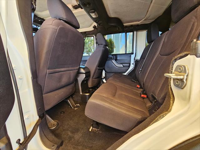 used 2014 Jeep Wrangler Unlimited car, priced at $13,995