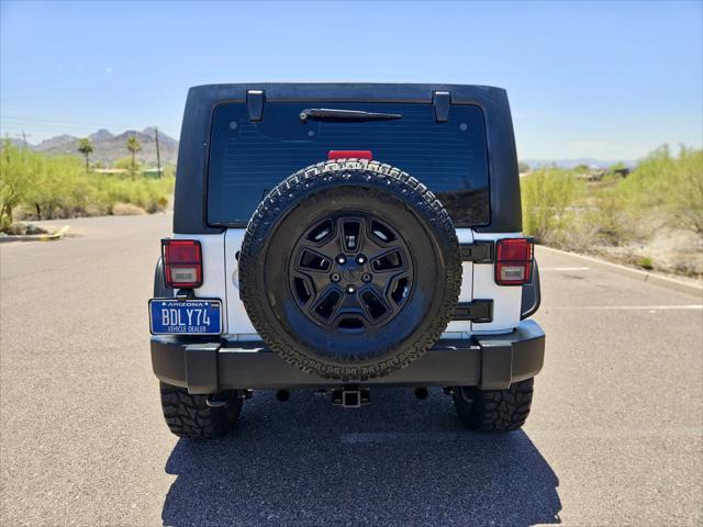 used 2014 Jeep Wrangler Unlimited car, priced at $13,995