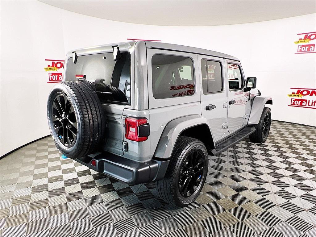 used 2023 Jeep Wrangler 4xe car, priced at $34,856