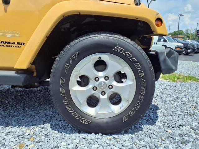 used 2013 Jeep Wrangler Unlimited car, priced at $16,998