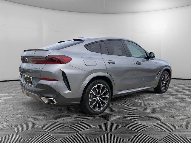 used 2024 BMW X6 car, priced at $68,900