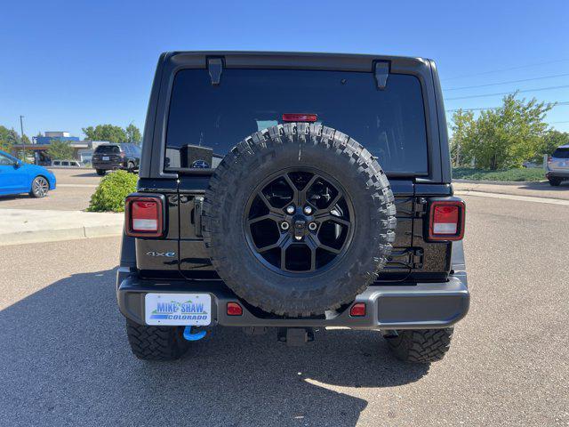 used 2024 Jeep Wrangler 4xe car, priced at $37,233