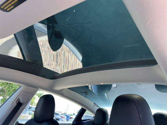 used 2022 Tesla Model 3 car, priced at $27,491