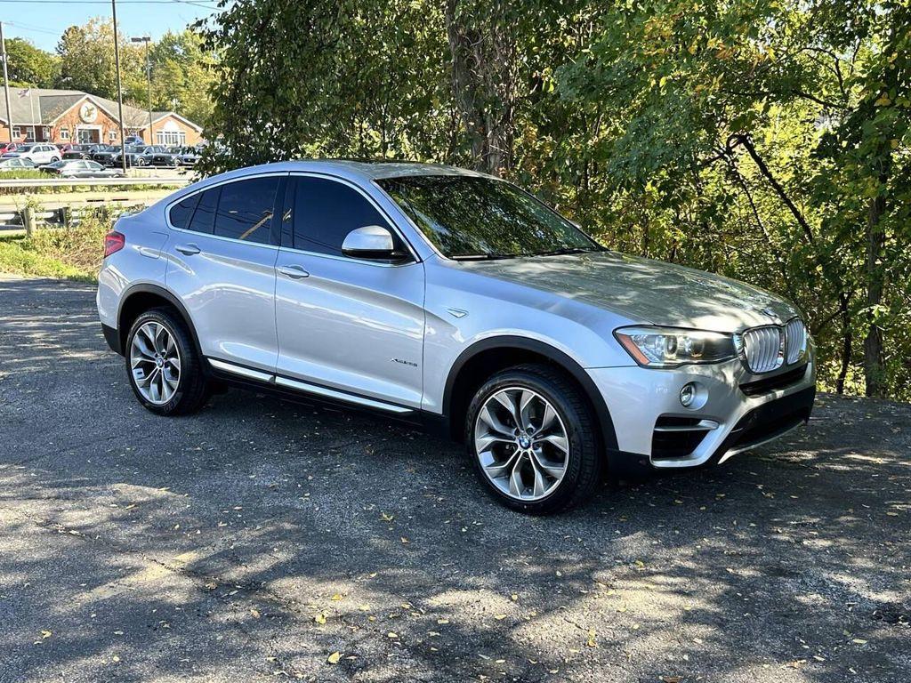 used 2016 BMW X4 car, priced at $13,600