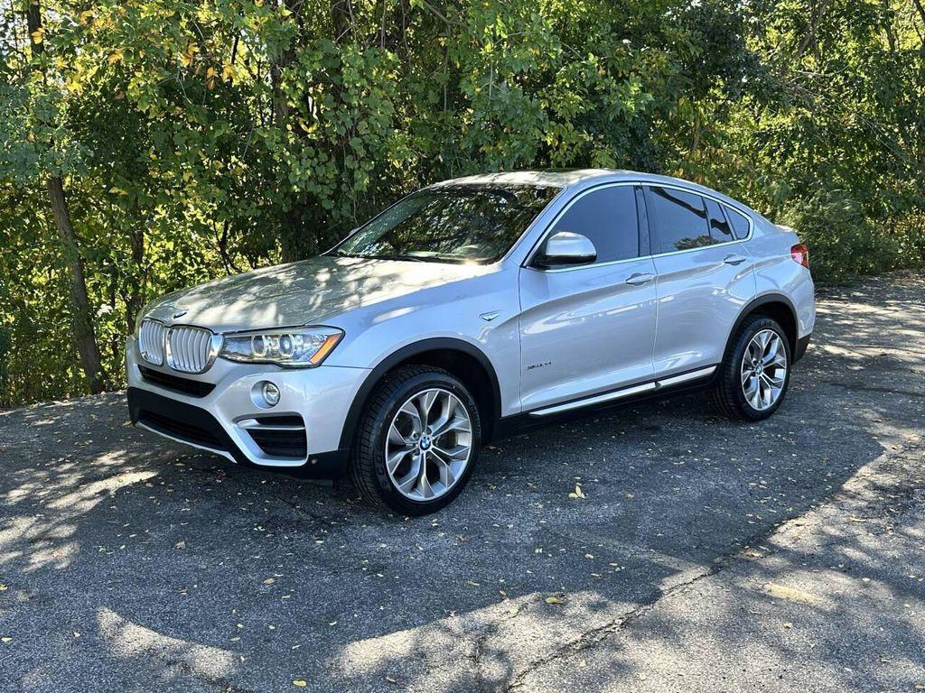 used 2016 BMW X4 car, priced at $13,600