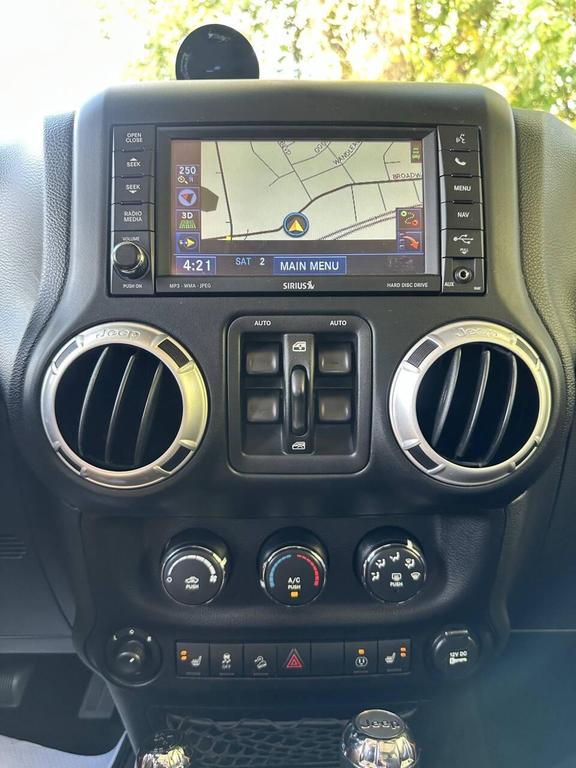 used 2013 Jeep Wrangler Unlimited car, priced at $18,400
