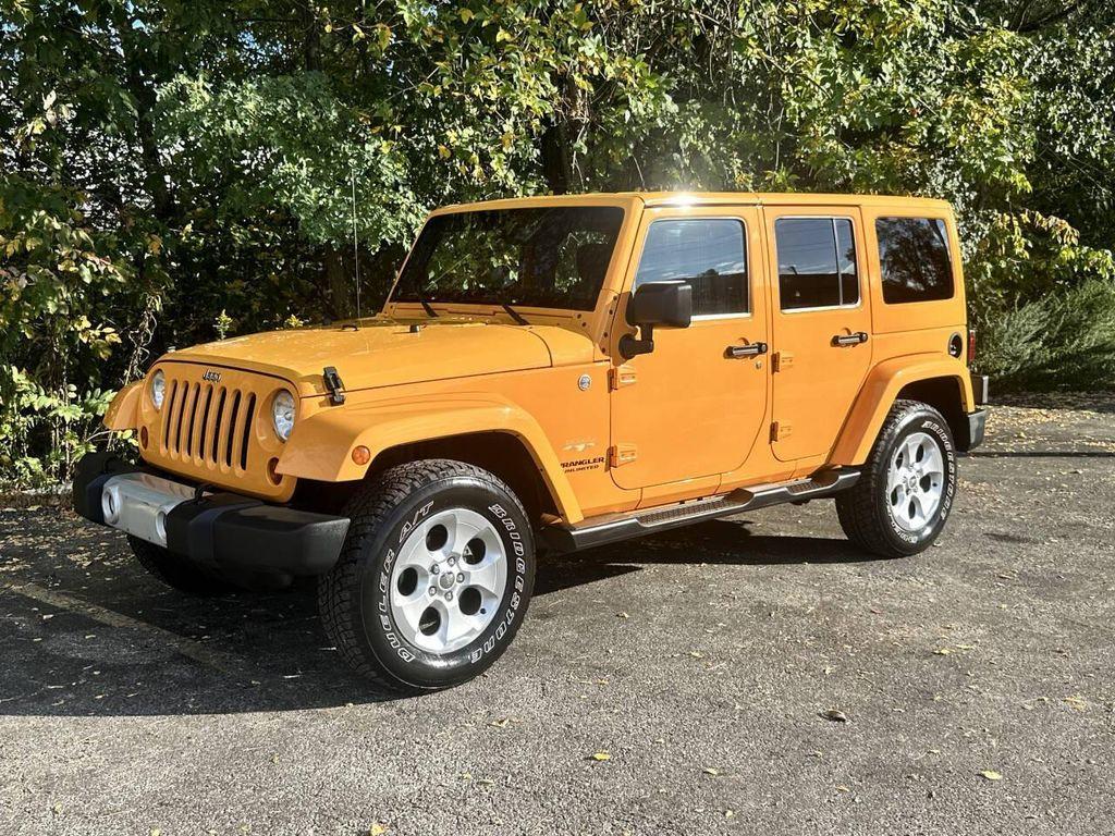 used 2013 Jeep Wrangler Unlimited car, priced at $16,400
