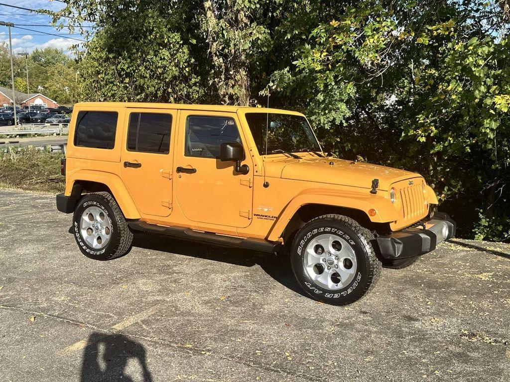 used 2013 Jeep Wrangler Unlimited car, priced at $16,400
