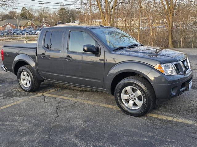 used 2013 Nissan Frontier car, priced at $12,800