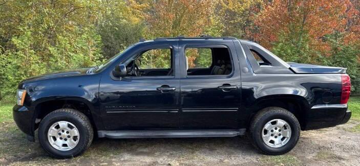 used 2013 Chevrolet Avalanche car, priced at $16,600