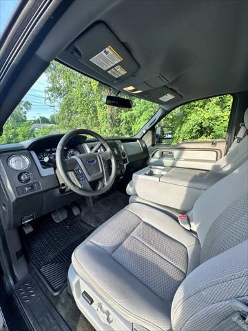 used 2014 Ford F-150 car, priced at $16,400