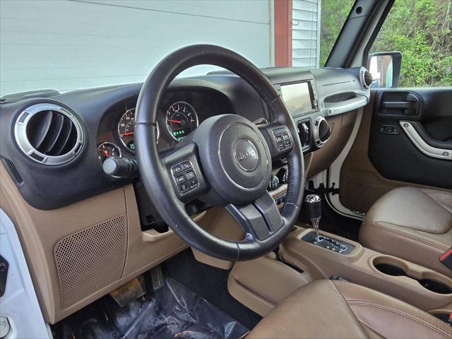 used 2015 Jeep Wrangler Unlimited car, priced at $15,550