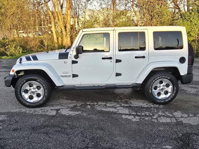 used 2015 Jeep Wrangler Unlimited car, priced at $15,550