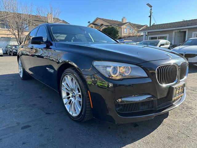 used 2012 BMW 750 car, priced at $11,995