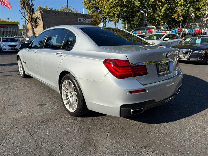 used 2014 BMW 750 car, priced at $9,995