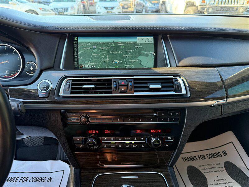used 2014 BMW 750 car, priced at $9,995
