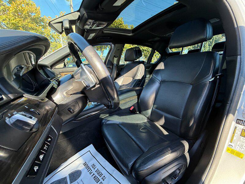 used 2014 BMW 750 car, priced at $9,995