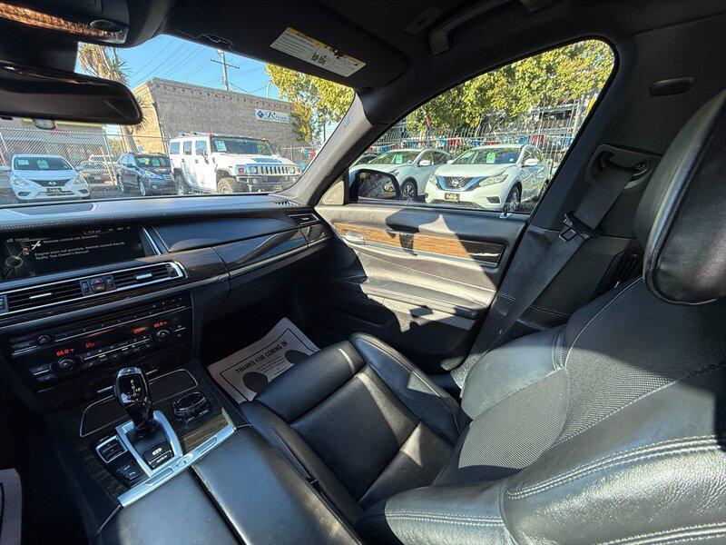 used 2014 BMW 750 car, priced at $9,995