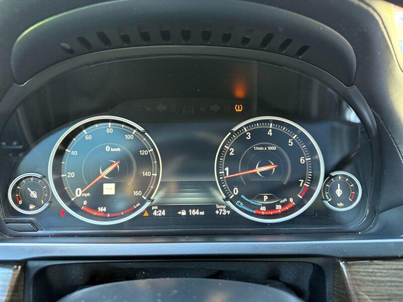 used 2014 BMW 750 car, priced at $9,995