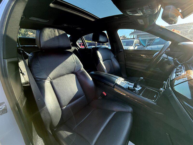 used 2014 BMW 750 car, priced at $9,995