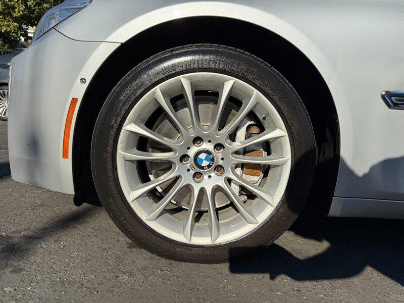 used 2014 BMW 750 car, priced at $9,995