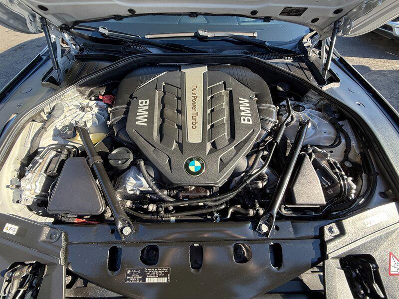 used 2014 BMW 750 car, priced at $9,995