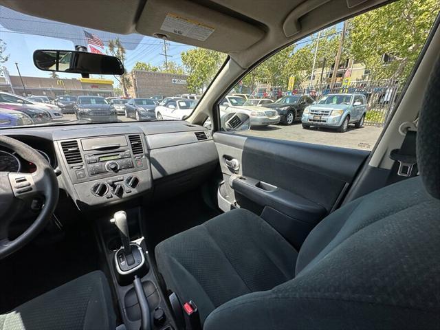 used 2011 Nissan Versa car, priced at $3,995