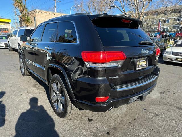 used 2014 Jeep Grand Cherokee car, priced at $14,995