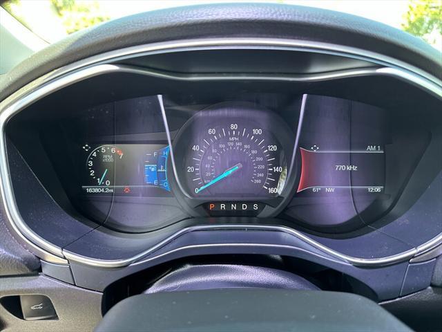 used 2015 Ford Fusion car, priced at $5,995
