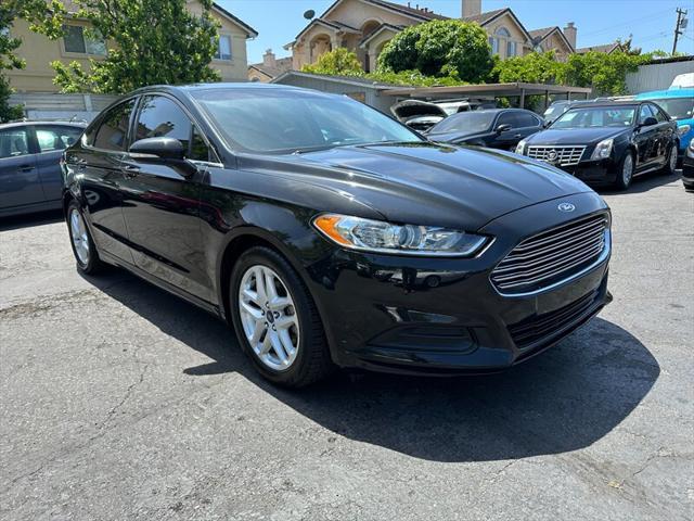 used 2015 Ford Fusion car, priced at $5,995