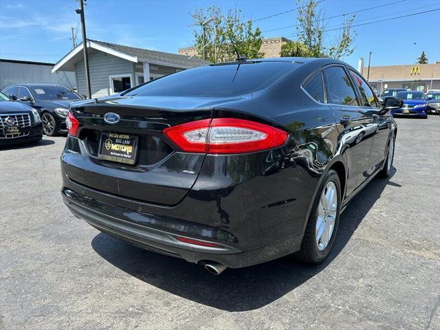 used 2015 Ford Fusion car, priced at $5,995