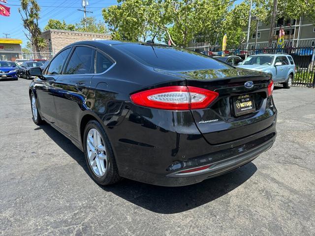 used 2015 Ford Fusion car, priced at $5,995
