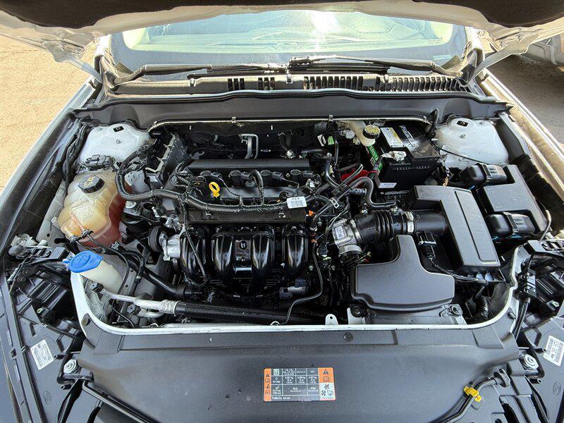 used 2016 Ford Fusion car, priced at $4,995
