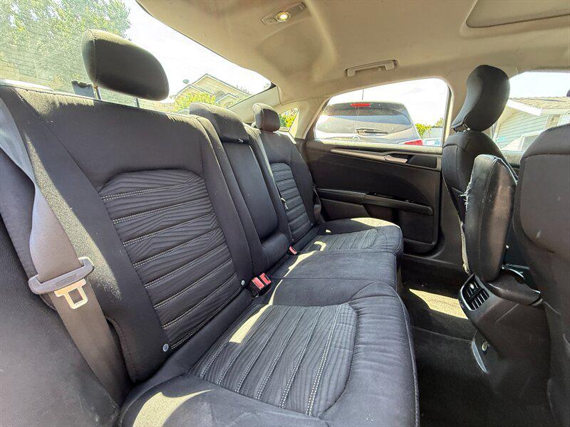 used 2016 Ford Fusion car, priced at $4,995