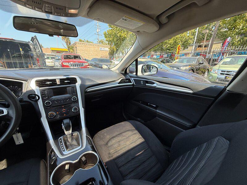 used 2016 Ford Fusion car, priced at $4,995