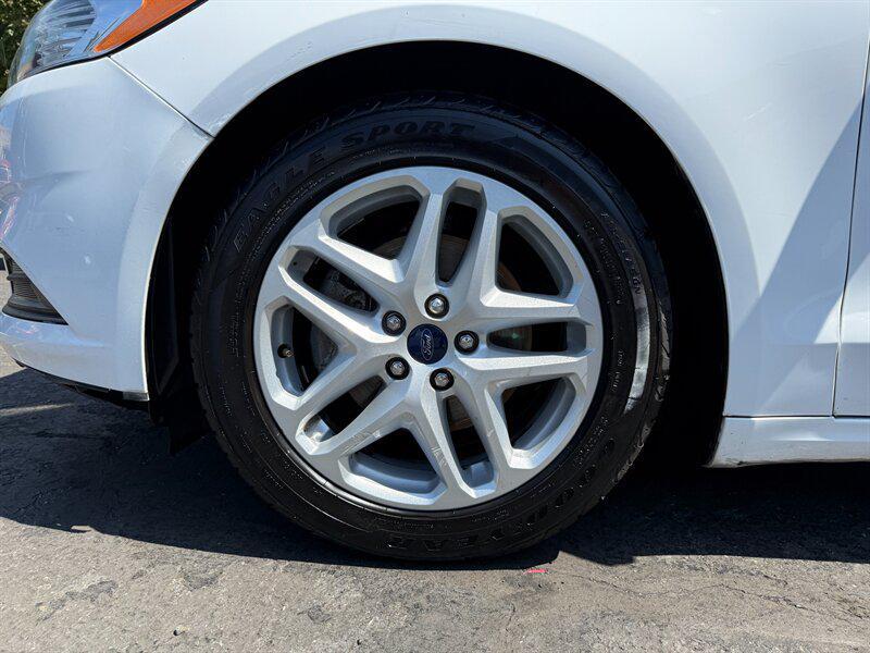 used 2016 Ford Fusion car, priced at $4,995