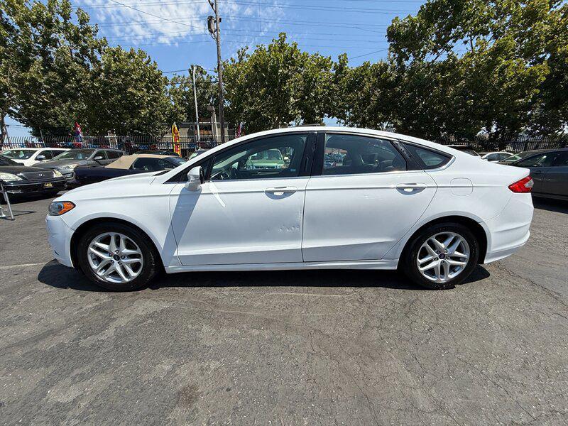 used 2016 Ford Fusion car, priced at $4,995