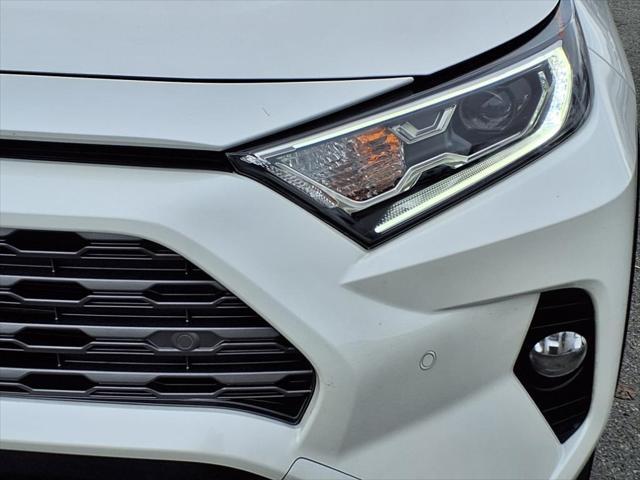 used 2019 Toyota RAV4 Hybrid car, priced at $30,000