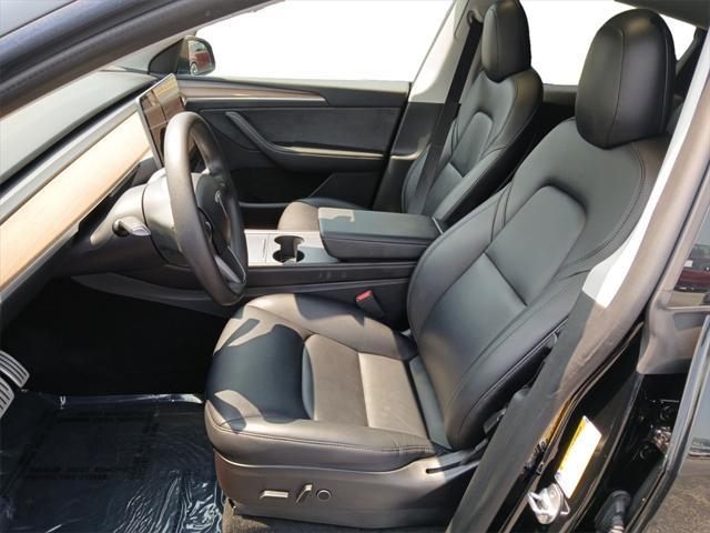 used 2023 Tesla Model Y car, priced at $30,500