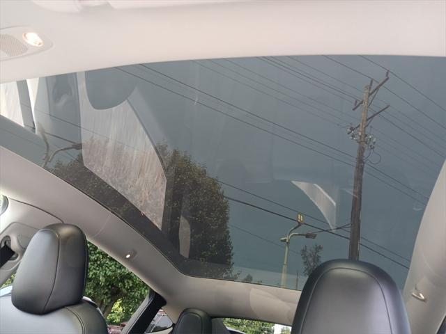 used 2023 Tesla Model Y car, priced at $30,500