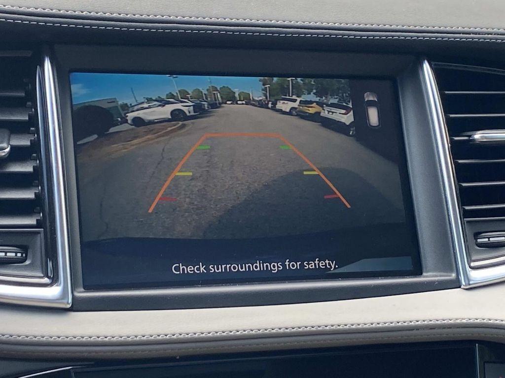 used 2024 INFINITI QX50 car, priced at $31,988