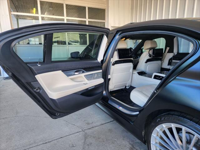 used 2016 BMW 750 car, priced at $27,950