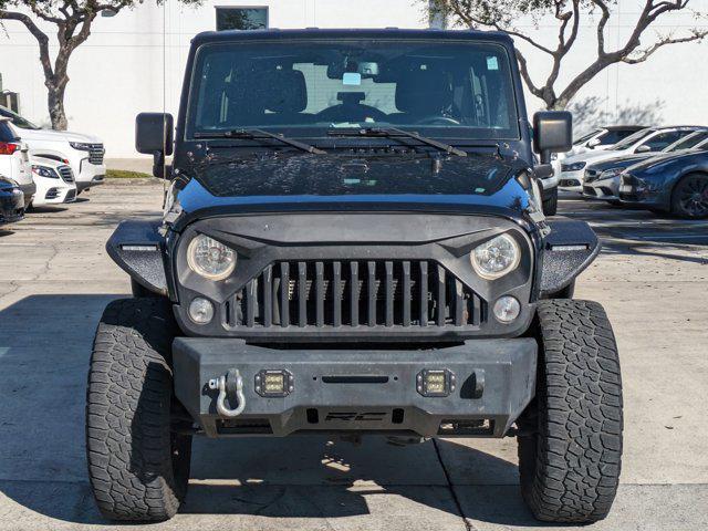 used 2016 Jeep Wrangler Unlimited car, priced at $15,495