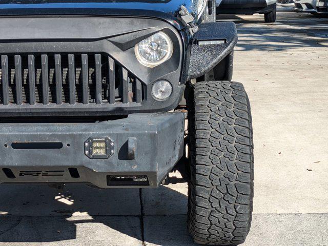 used 2016 Jeep Wrangler Unlimited car, priced at $15,495