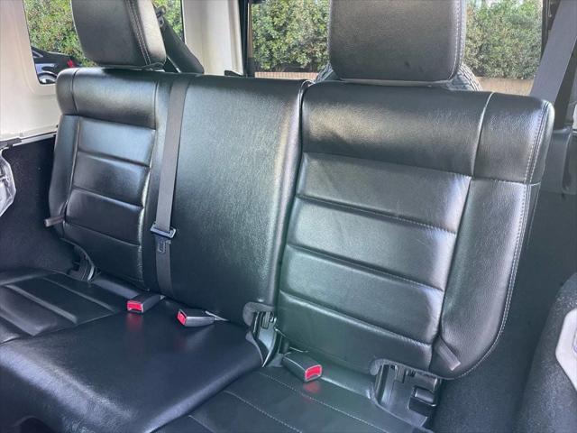 used 2012 Jeep Wrangler Unlimited car, priced at $13,999