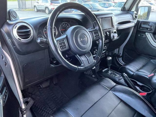 used 2012 Jeep Wrangler Unlimited car, priced at $13,999