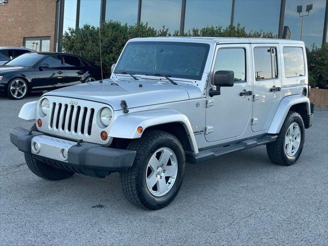 used 2012 Jeep Wrangler Unlimited car, priced at $13,999