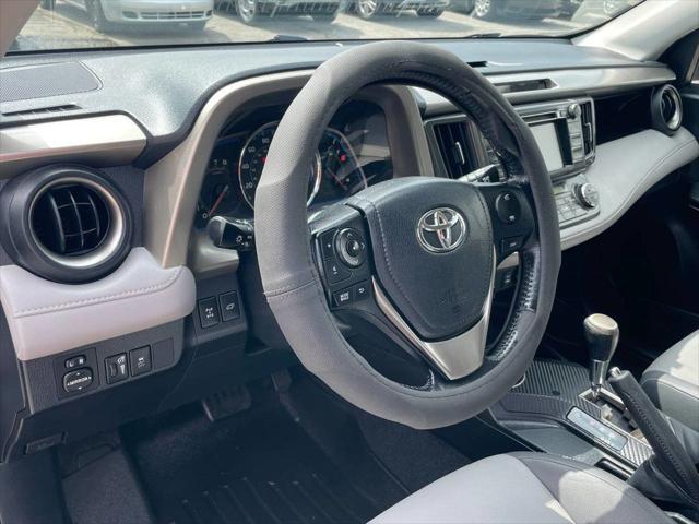 used 2013 Toyota RAV4 car, priced at $11,995