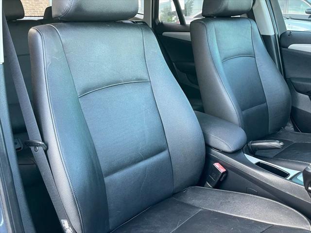 used 2014 BMW X1 car, priced at $7,499