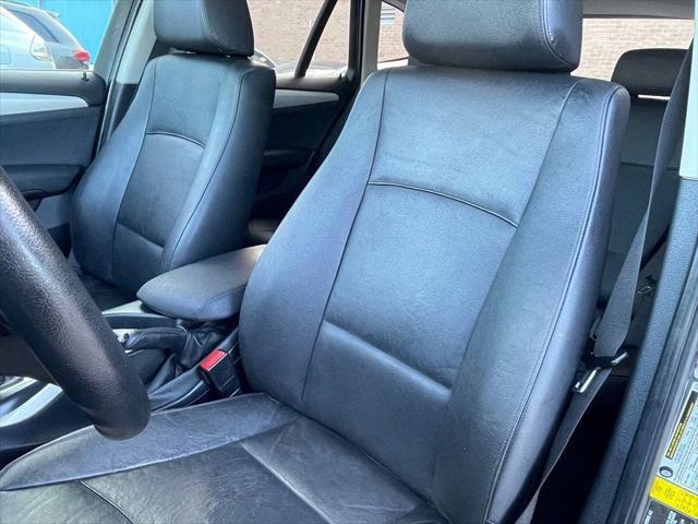 used 2014 BMW X1 car, priced at $6,998